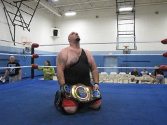 In disbelief, Dean "The Beast" Livsley holds his first Championship belt.